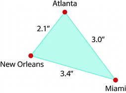 Myndin sýnir þríhyrning með hornin Atlanta, Miami og New Orleans. Hliðin Atlanta–Miami er 3 tommur, Miami–New Orleans 3.4 tommur og New Orleans–Atlanta 2.1 tommur.