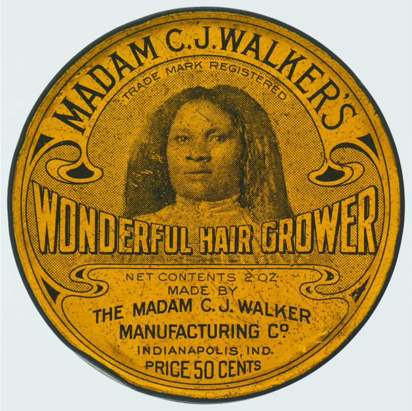 Mynd af miða á Wonderful Hair Grower-vöru Madam C. J. Walker. Á miðanum stendur: Nettóinnihald 2 únsur. Framleitt af Madam C. J. Walker Manufacturing Co., Indianapolis, Indiana. Verð 50 sent.