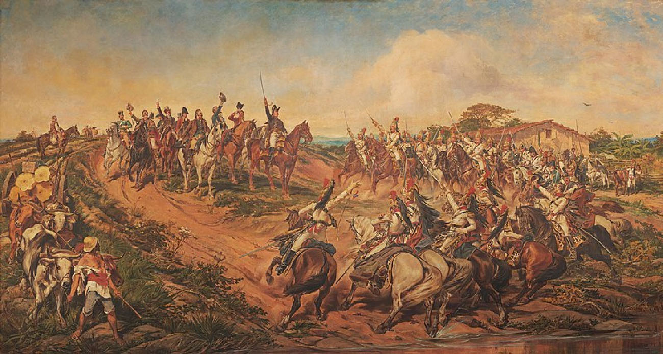 Pedro I er fyrir miðju málverki. Hann situr á hesti og heldur sverði sínu á lofti. Hópur karla fyrir aftan hann situr einnig á hestum og heldur höttum sínum á lofti. Hópur einkennisklæddra hermanna á hestbaki snýr að honum og lyftir sverðum sínum. Bóndi sem leiðir kýr sínar horfir á hópinn.